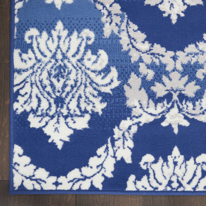 4' X 6' Blue And Ivory Floral Dhurrie Area Rug