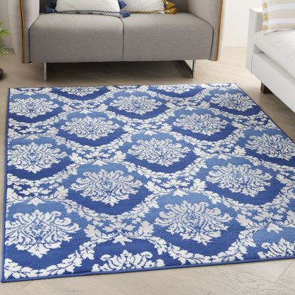 4' X 6' Blue And Ivory Floral Dhurrie Area Rug