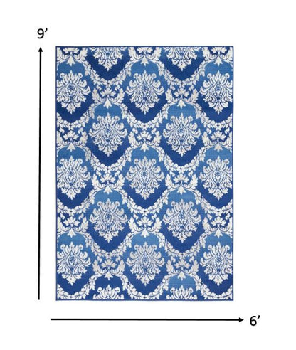 4' X 6' Blue And Ivory Floral Dhurrie Area Rug