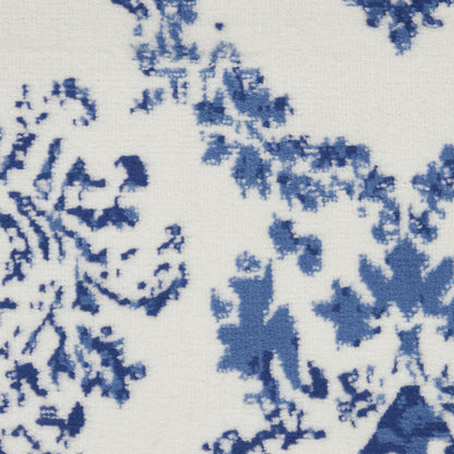 4' X 6' Blue And Ivory Floral Dhurrie Area Rug