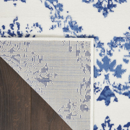 4' X 6' Blue And Ivory Floral Dhurrie Area Rug