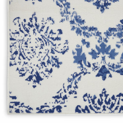 4' X 6' Blue And Ivory Floral Dhurrie Area Rug