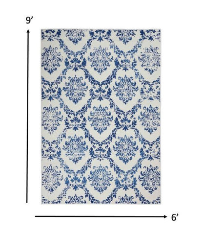 4' X 6' Blue And Ivory Floral Dhurrie Area Rug