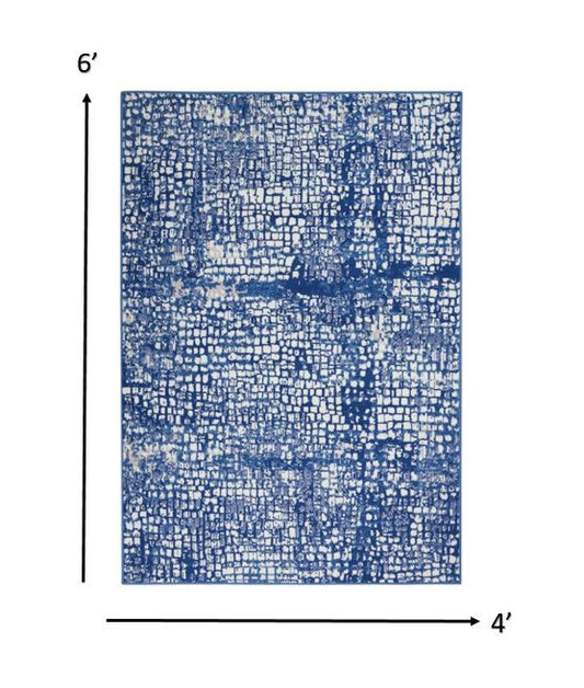 5' X 7' Blue And Ivory Abstract Dhurrie Area Rug