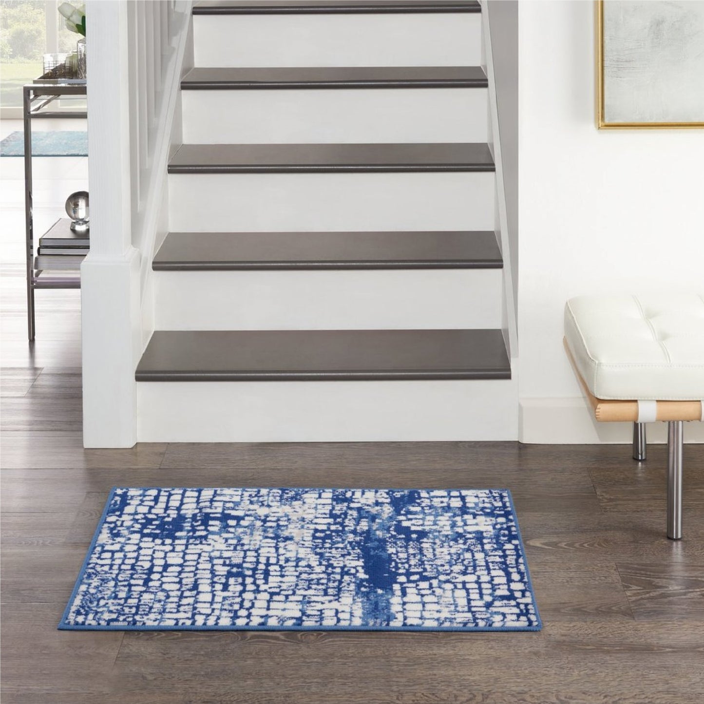 5' X 7' Blue And Ivory Abstract Dhurrie Area Rug