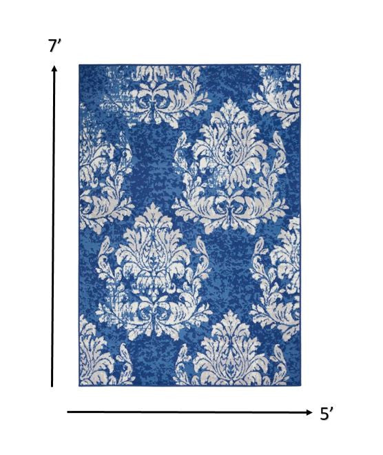 4' X 6' Blue And Ivory Floral Dhurrie Area Rug