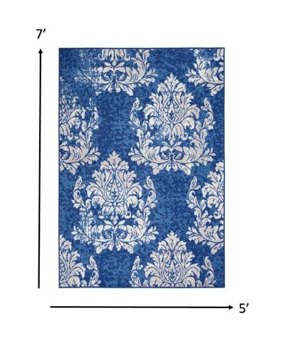 4' X 6' Blue And Ivory Floral Dhurrie Area Rug