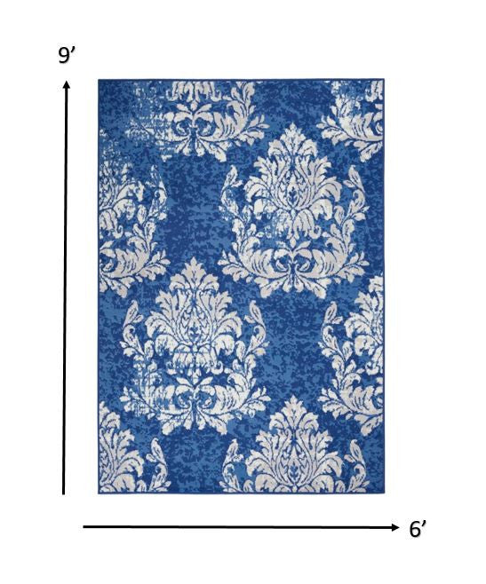 4' X 6' Blue And Ivory Floral Dhurrie Area Rug