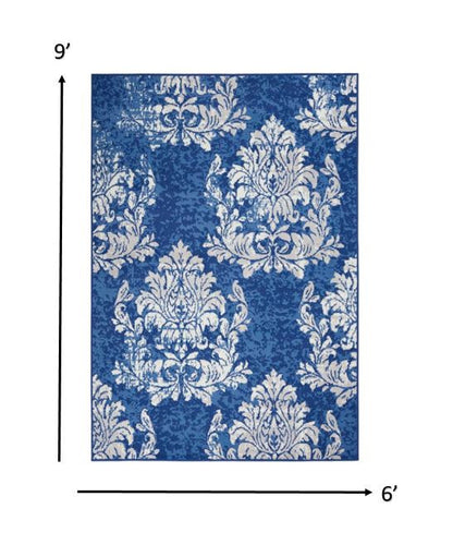 4' X 6' Blue And Ivory Floral Dhurrie Area Rug