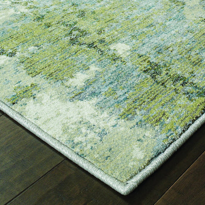 7’ X 10’ Blue And Sage Distressed Waves Indoor Area Rug