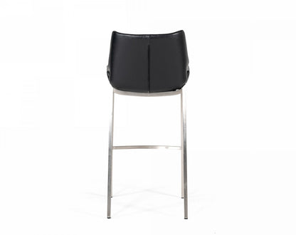 Set Of Two 42" Black Faux Leather And Steel Low Back Bar Height Chairs With Footrest