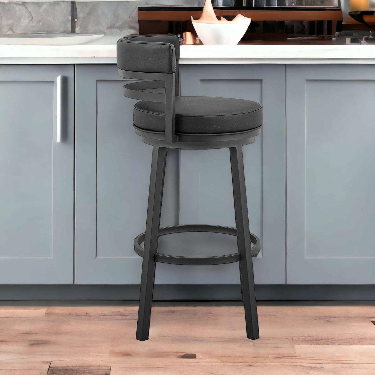 30" Black Faux Leather And Iron Swivel Low Back Bar Height Bar Chair With Footrest
