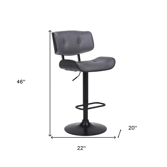 Adjustable Gray Tufted Faux Leather and Black Wood Swivel Barstool.