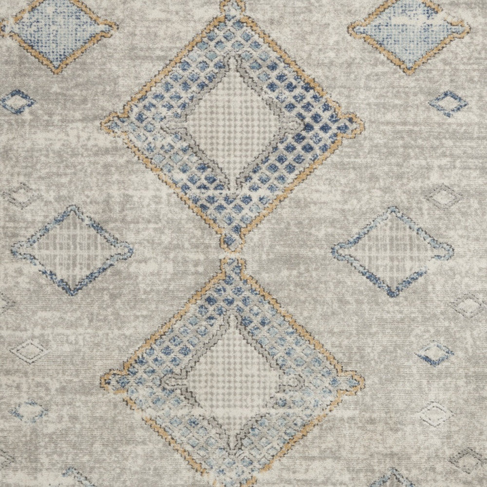 5' X 7' Ivory Grey And Blue Southwestern Power Loom Non Skid Area Rug