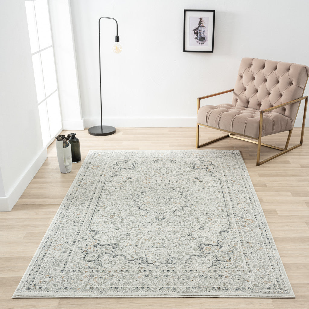 5' X 8' Ivory Gray And Taupe Floral Power Loom Stain Resistant Area Rug