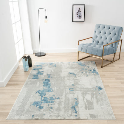2' X 3' Ivory Gray And Blue Abstract Stain Resistant Area Rug