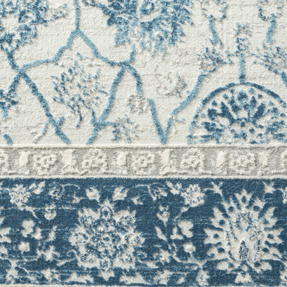9' X 12' Blue Gray And Ivory Floral Power Loom Stain Resistant Area Rug