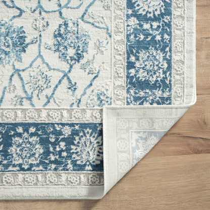 9' X 12' Blue Gray And Ivory Floral Power Loom Stain Resistant Area Rug