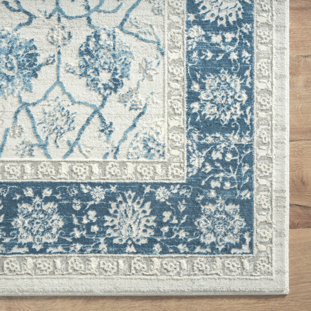 9' X 12' Blue Gray And Ivory Floral Power Loom Stain Resistant Area Rug