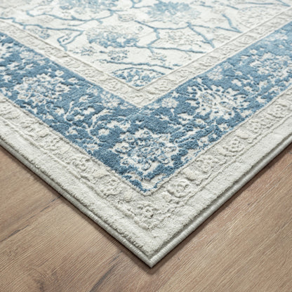 9' X 12' Blue Gray And Ivory Floral Power Loom Stain Resistant Area Rug