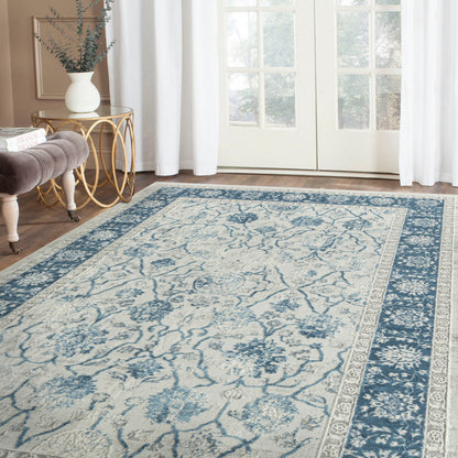 9' X 12' Blue Gray And Ivory Floral Power Loom Stain Resistant Area Rug