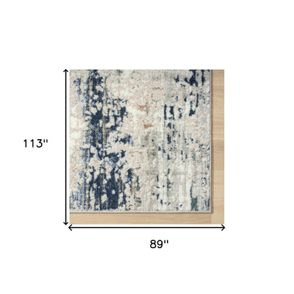 7' X 9' Beige Cream Blue And Gray Abstract Stain Resistant Area Rug