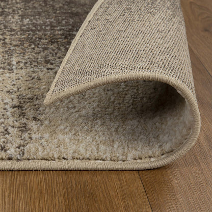 7' X 9' Beige Gray And Black Damask Distressed Stain Resistant Area Rug