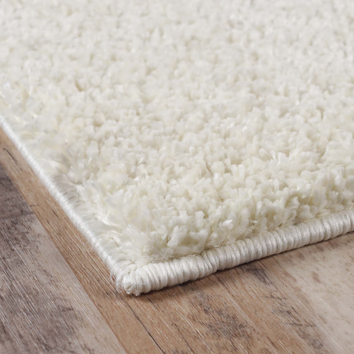 8' X 10' Ivory Shag Stain Resistant Area Rug