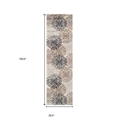 10' Tan Gray And Black Floral Medallion Stain Resistant Runner Rug