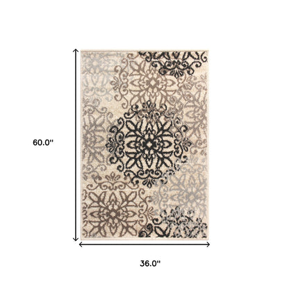 3' X 5' Beige And Gray Medallion Power Loom Stain Resistant Area Rug
