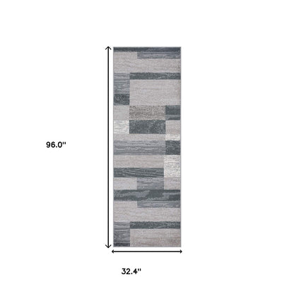 8' Blue And Taupe Patchwork Power Loom Stain Resistant Runner Rug