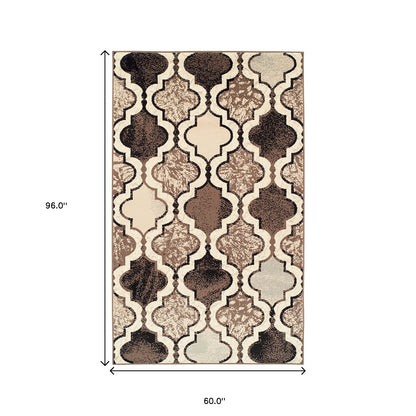 5' X 8' Ivory Quatrefoil Power Loom Distressed Stain Resistant Area Rug