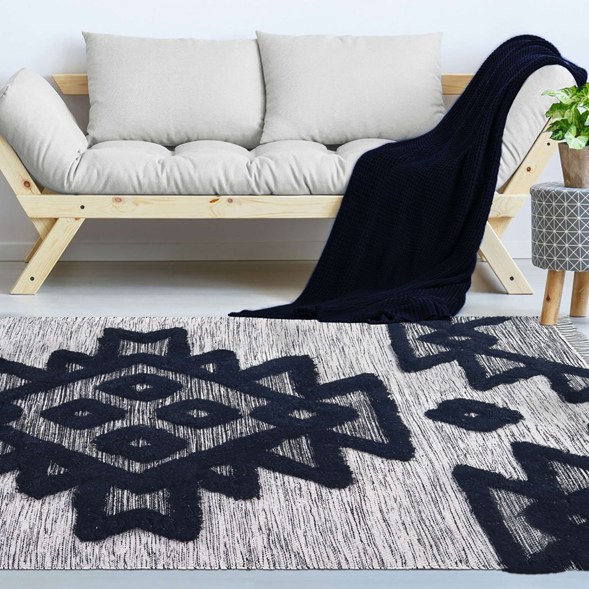 8' X 10' Black And Ivory Wool Geometric Power Loom Stain Resistant Area Rug With Fringe