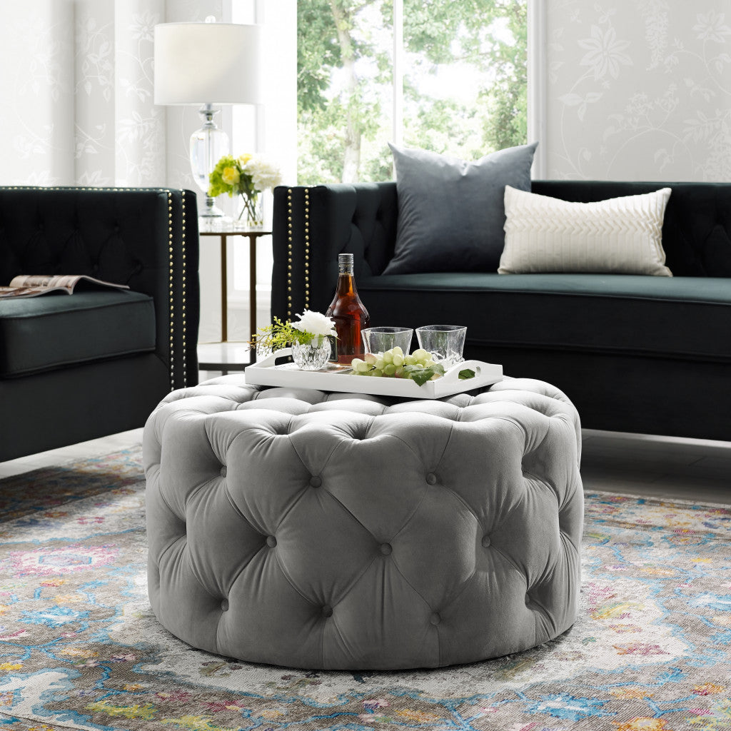 33" Blush Velvet And Black Rolling Tufted Round Cocktail Ottoman