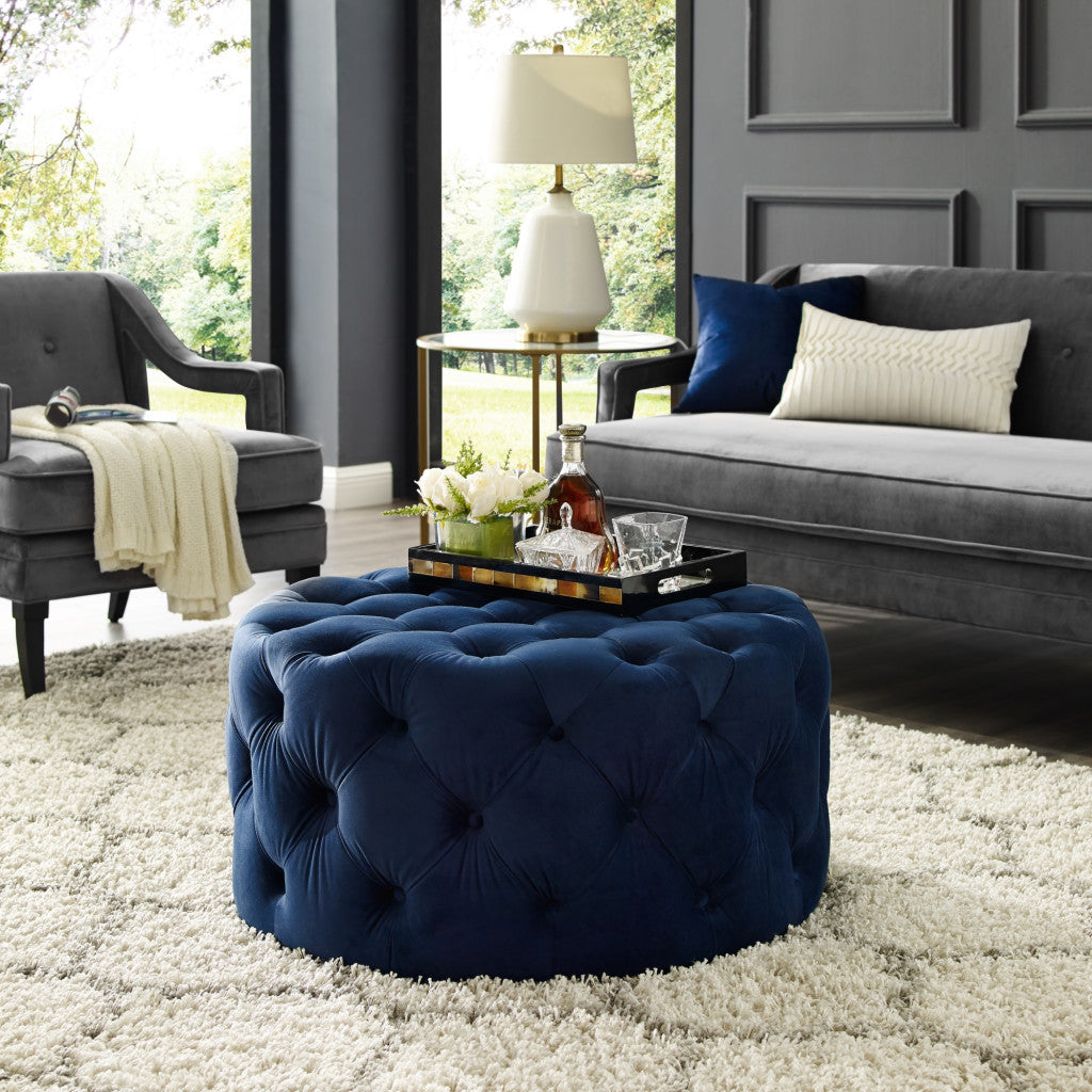 33" Blush Velvet And Black Rolling Tufted Round Cocktail Ottoman