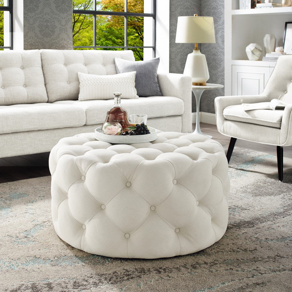 33" Blush Velvet And Black Rolling Tufted Round Cocktail Ottoman