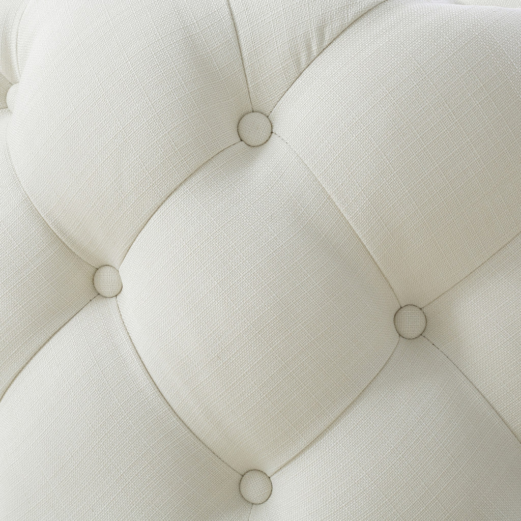 33" Blush Velvet And Black Rolling Tufted Round Cocktail Ottoman