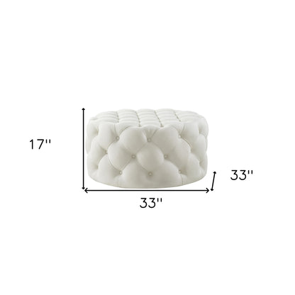 33" Blush Velvet And Black Rolling Tufted Round Cocktail Ottoman