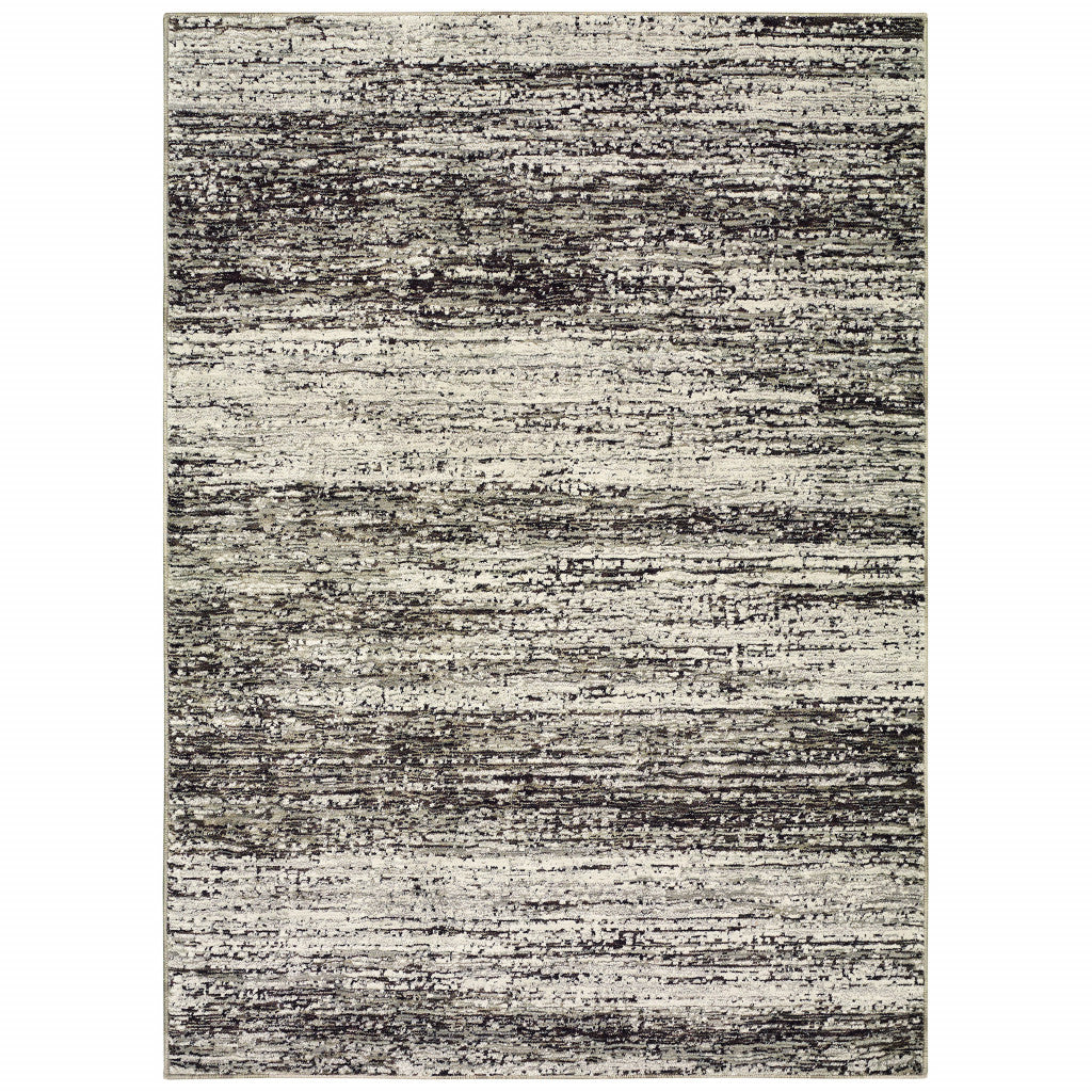 2' X 3' Charcoal Grey Silver And Ivory Abstract Power Loom Stain Resistant Area Rug