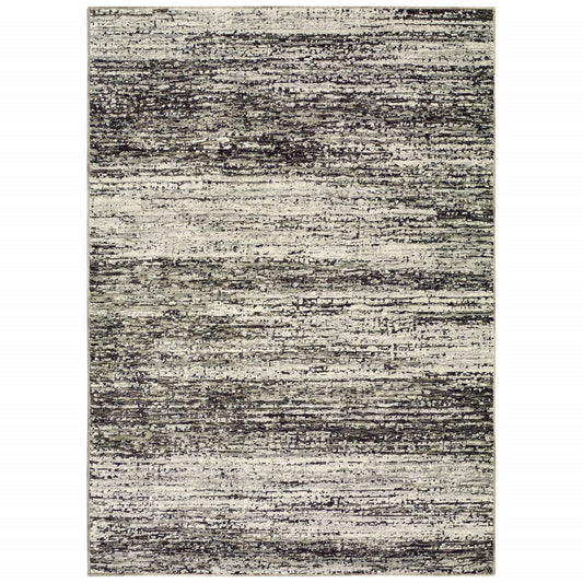 2' X 3' Charcoal Grey Silver And Ivory Abstract Power Loom Stain Resistant Area Rug