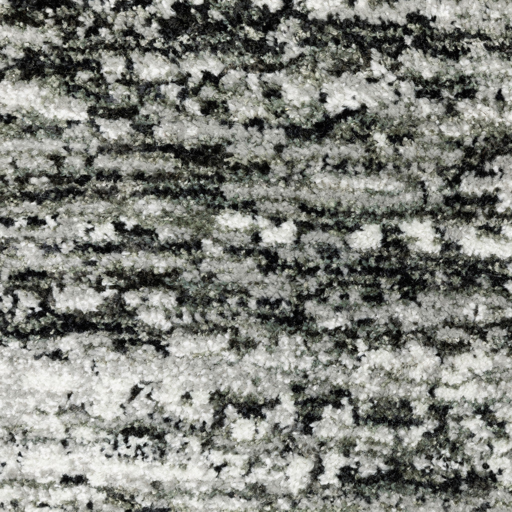 2' X 3' Charcoal Grey Silver And Ivory Abstract Power Loom Stain Resistant Area Rug