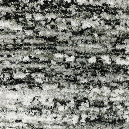 2' X 3' Charcoal Grey Silver And Ivory Abstract Power Loom Stain Resistant Area Rug