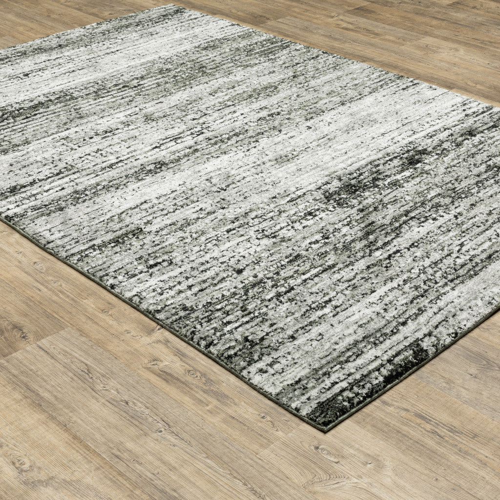 2' X 3' Charcoal Grey Silver And Ivory Abstract Power Loom Stain Resistant Area Rug