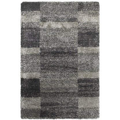 5' x 8' Black and Gray Geometric Shag Power Loom Area Rug