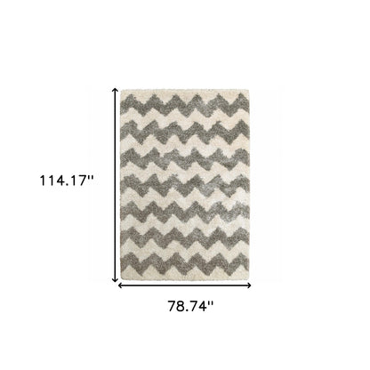 6' X 9' Grey And Ivory Geometric Shag Power Loom Stain Resistant Area Rug