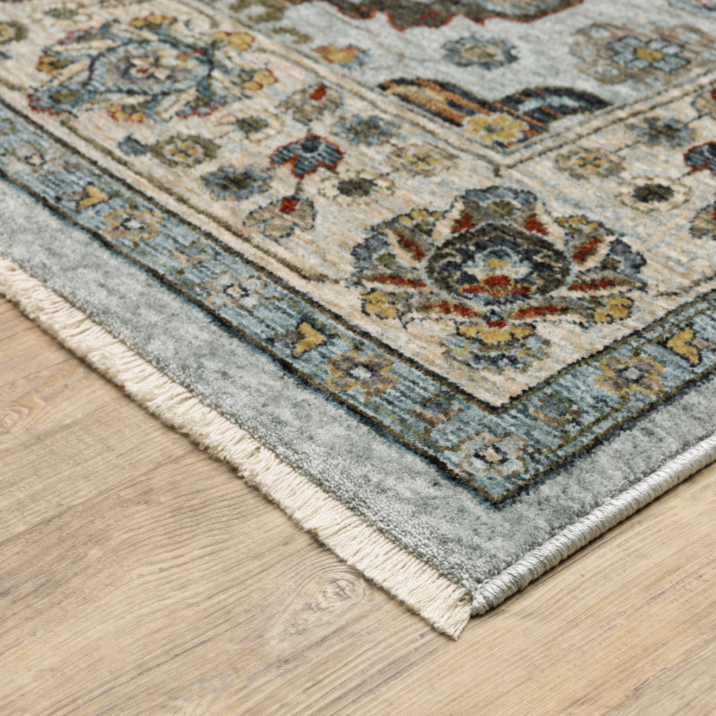 6' X 9' Blue Beige Grey Green Yellow And Rust Oriental Power Loom Stain Resistant Area Rug With Fringe