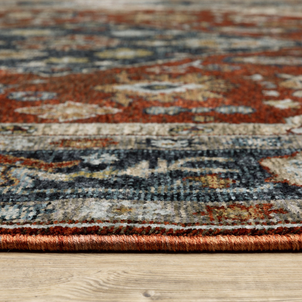 6' X 9' Blue Beige Tan Brown Gold And Rust Red Oriental Power Loom Stain Resistant Area Rug With Fringe