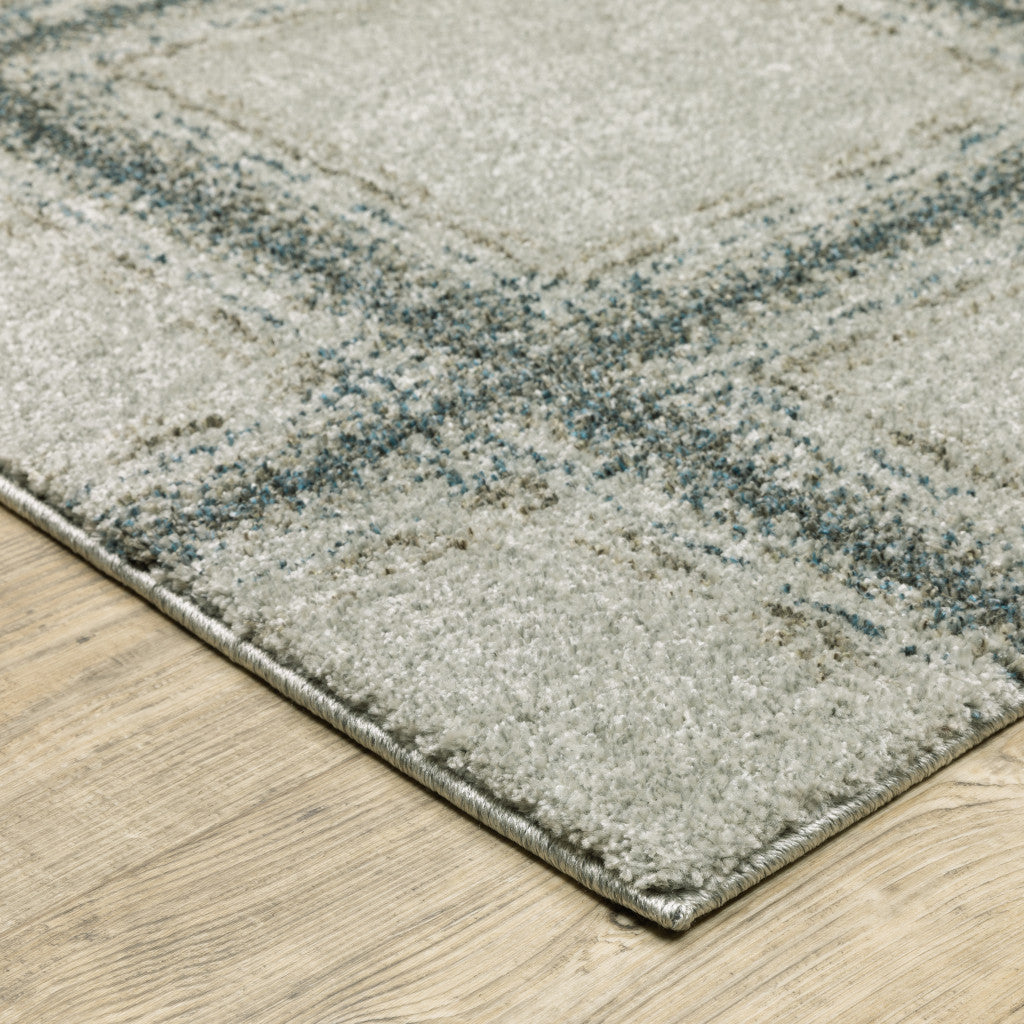 6' X 9' Grey Teal And Beige Geometric Power Loom Stain Resistant Area Rug