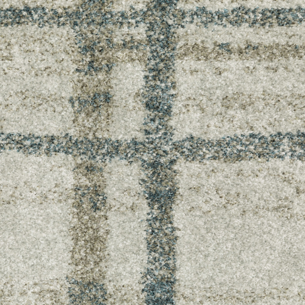 3' X 5' Grey Teal Beige And Tan Geometric Power Loom Stain Resistant Area Rug