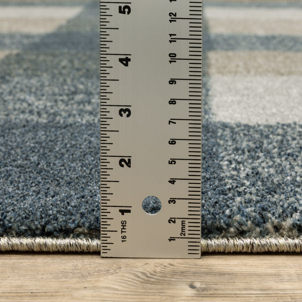 5' X 8' Teal Grey Tan And Beige Geometric Power Loom Stain Resistant Area Rug